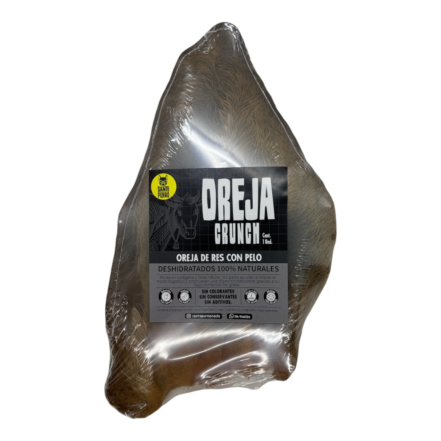 Oreja de res entera con pelo natural deshidratada de Santo Perro. Snack recreativo para perros medianos y grandes que ayuda a la limpieza intestinal y salud articular.