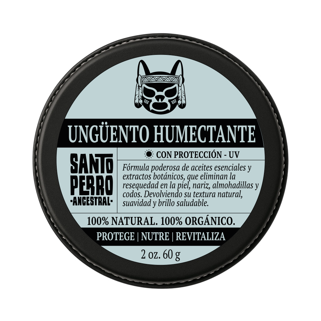 Ungüento hidratante 100% natural de Santo Perro para perros y gatos. Fórmula con cera de abejas, mantecas y aceites vegetales que hidratan, suavizan y protegen la piel de forma preventiva. Envase redondo metálico sobre fondo neutro.